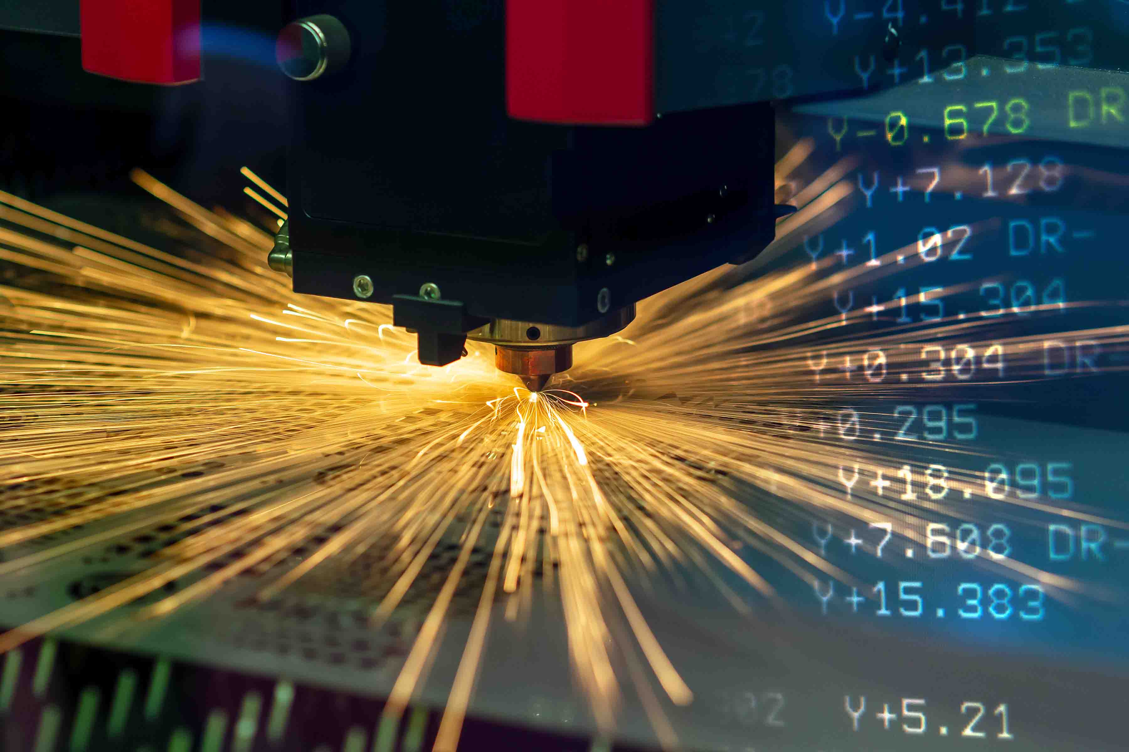 Laser cutting with NC program information illustrated alongside the machine